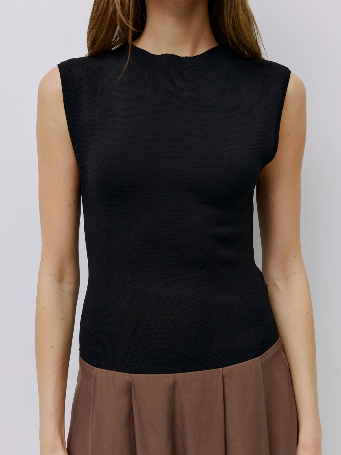Contrast Two Tone Sleeveless Knit Dress with Pleated Skirt